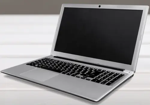 A blank laptop sitting on a table.